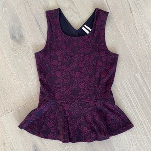 Purple Peplum top with embroidered flower design